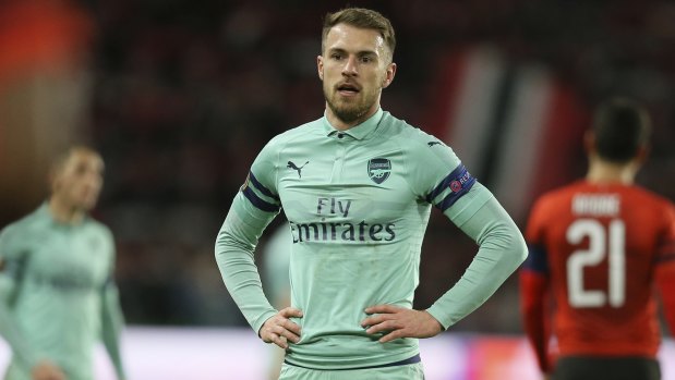 Arsenal's Aaron Ramsey reacts after the loss to Rennes.