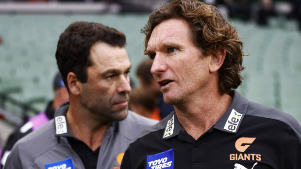 Giants assistant coaches and former Essendon teammates, Dean Solomon and James Hird.