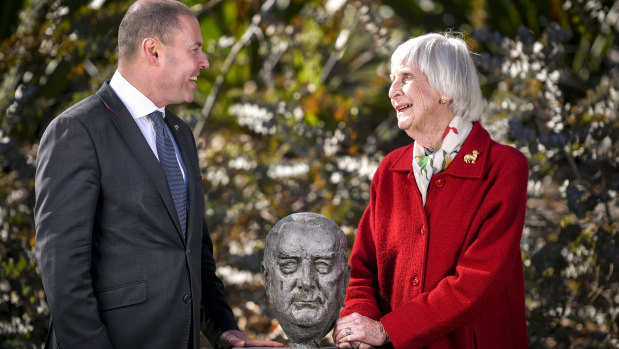 New Liberal deputy leader Josh Frydenberg and Sir Robert Menzies' daughter Heather Henderson at the Menzies statue in Kew.