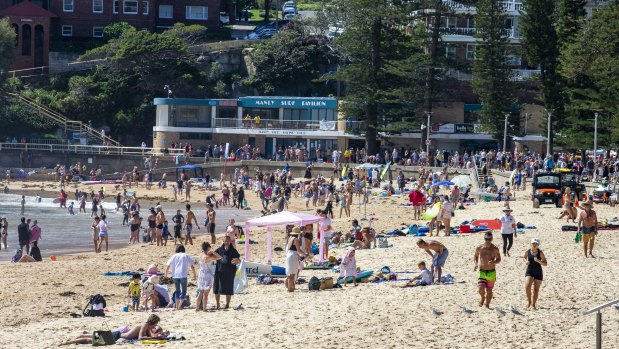 Crowds exercise on Manly Beach, in the southern part of the northern beaches, on Sunday.