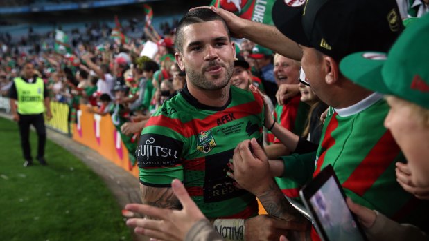 Adam Reynolds celebrates with Rabbitohs fans after starring in the 2014 grand final victory.