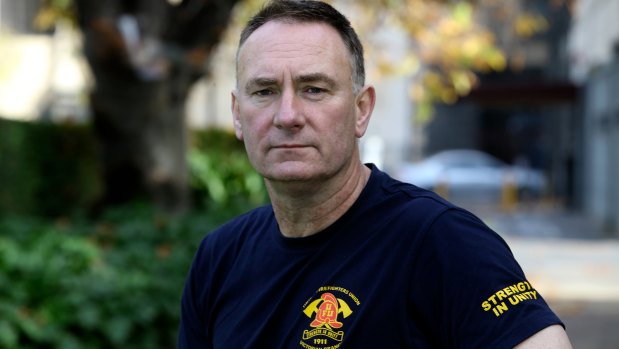 Peter Marshall, United Firefighters Union secretary, says fireys should not have to relive their trauma to get treatment. 