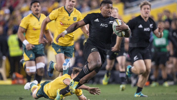 Steamrolled: Waisake Naholo heads to the try line in the All Blacks thrashing of the Wallabies.