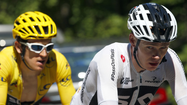 Delicate balance: Race leader Geraint Thomas, in yellow, and Sky teammate Chris Froome.