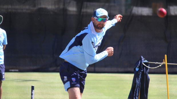 Nathan Lyon rolls the arm over ahead of NSW's Shield match at the SCG this week.