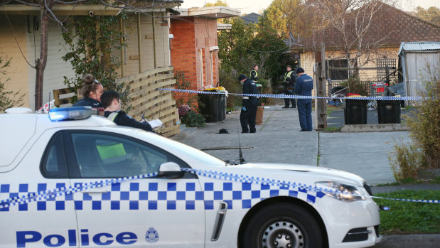 Police at the scene of the fatal stabbing in Dandenong.