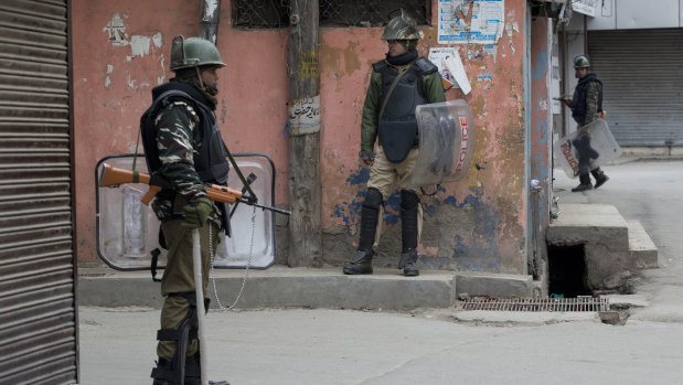 Indian paramilitary soldiers stand guard in Srinagar, Indian-controlled Kashmir.
