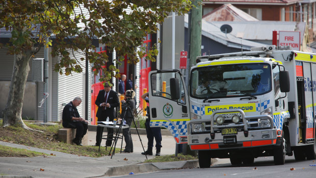 Police conduct an investigation in Denison Street, Wollongong, after a man was stabbed to death there.