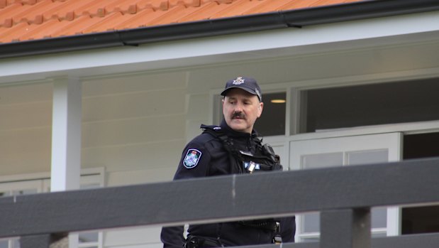 A police officer at the crime scene.
