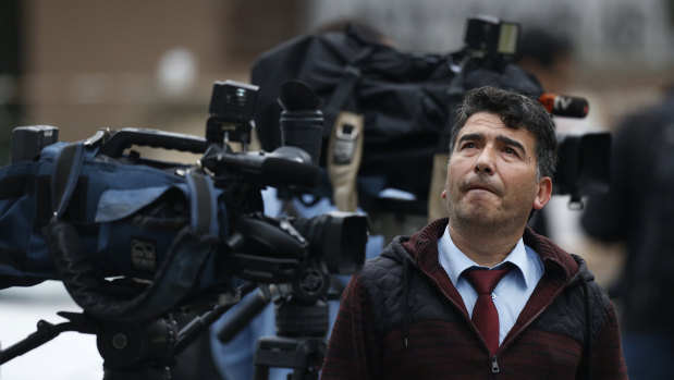 Members of the media report outside Saudi Arabia's consulate in Istanbul on Thursday.