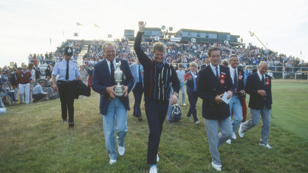 Sandy Lyle of Scotland celebrates his victory in the 114th Open Championship at Royal St George’s in Sandwich, Kent.