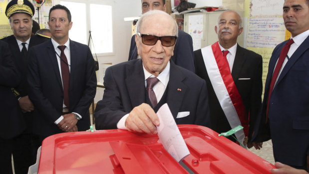 Tunisian President Beji Caid Essebsi casts his vote for city and town councils earlier this year.
