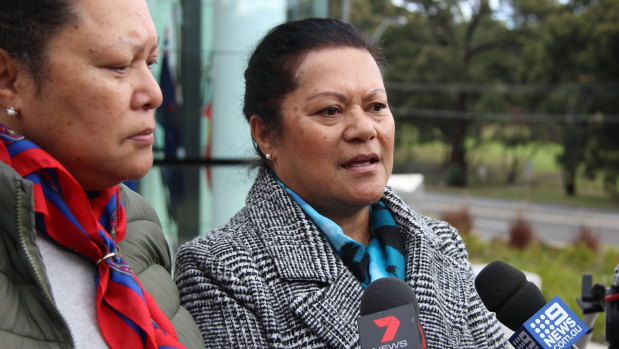 Mrs Pahiva's daughters Epe Tutoka (right) and Sasai Pahiva speak outside the NSW Coroner's Court.
