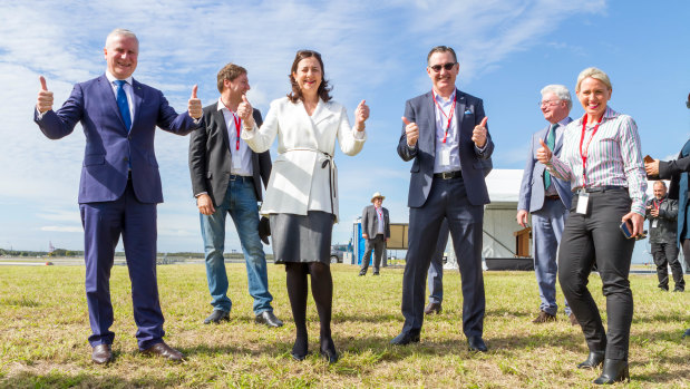 (Front, from left) Deputy Prime Minister Michael McCormack, Queensland Premier Annastacia Palaszczuk, Brisbane Airport parallel runway project director Paul Coughlan and Minister for State Development, Tourism and Innovation Kate Jones celebrate the first flight.