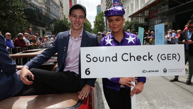 Jockey Jordan Childs takes it all in at the Melbourne Cup parade on Monday.