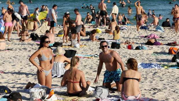 Bondi Beach on Friday, March 20, when thousands flocked to the water, ignoring social distancing edicts.