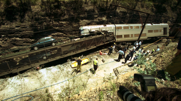 Locked in a deadly embrace... Scene of the train crash at Glenbrook, NSW on December 2, 1999.