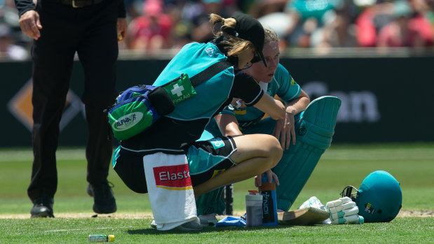 Struggling: Beth Mooney needed anti-nausea medication, Ventolin and water to get her through a difficult innings. 