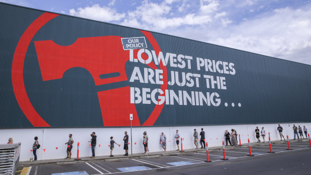 People social distancing as they queue to enter the Bunnings Warehouse in Croydon on Sunday. 