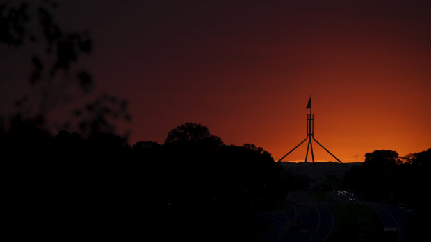A dramatic sunrise sweeps over Canberra ahead of a dramatic day in national politics. 
