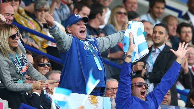 Diego Maradona celebrates an Argentina try against Tonga at the 2015 Rugby World Cup.