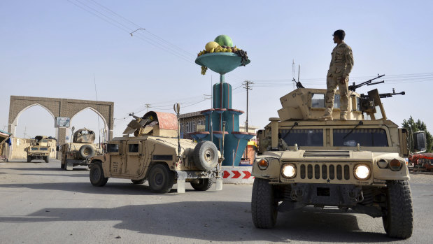 Afghan Security personnel patrol in the city of Ghazni province west of Kabul, Afghanistan. 