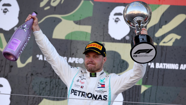 Flying Finn: Race winner Valterri Bottas celebrates in Suzuka.