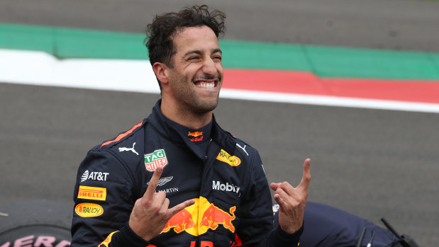 Rock star: Daniel Ricciardo rejoices after securing a rare pole position for himself and Red Bull.