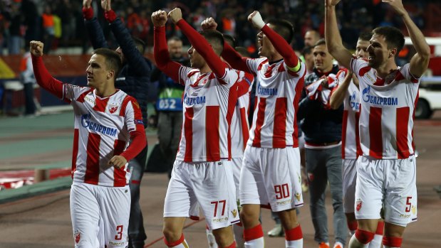 Giant killers: Red Star players wave to their fans after full time.