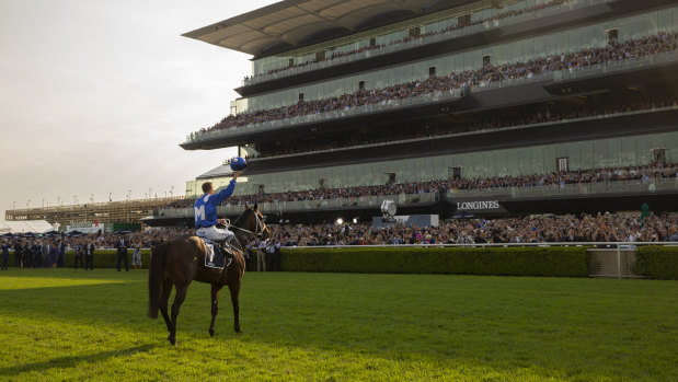 All hail the Queen: Hugh Bowman and Winx return to scale one last time in front of the Randwick faithful.