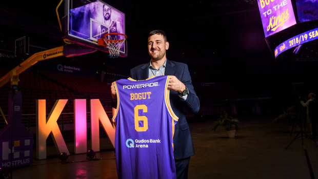 Star power: Andrew Bogut unveils his No.6 jersey after signing for the Sydney Kings.