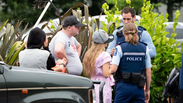 Police talking to the family at a Burger King in Hamilton.