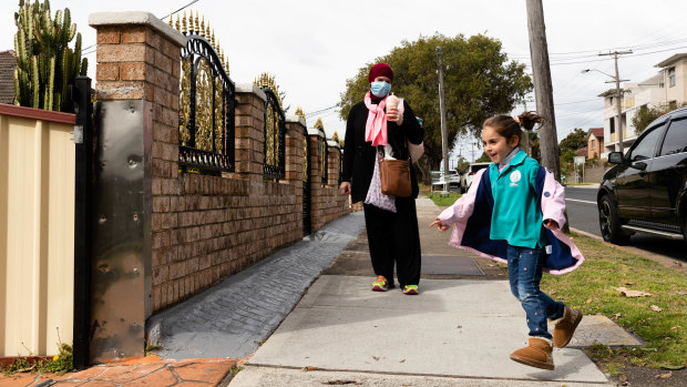 Ema Akl collects her daughter from childcare in Chester Hill in the Canterbury-Bankstown LGA which is an “area of concern”. She is an essential worker in a supermarket and is fully vaccinated. 