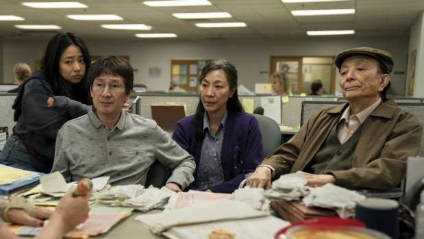 At the tax audit: Stephanie Hsu, Ke Huy Quan, Michelle Yeoh and James Hong in Everything Everywhere All At Once.
