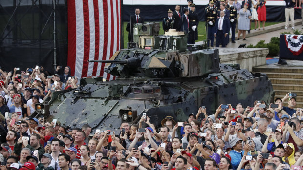 A Bradley Fighting Vehicle and audience members during an Independence Day celebration in front of the Lincoln Memorial.