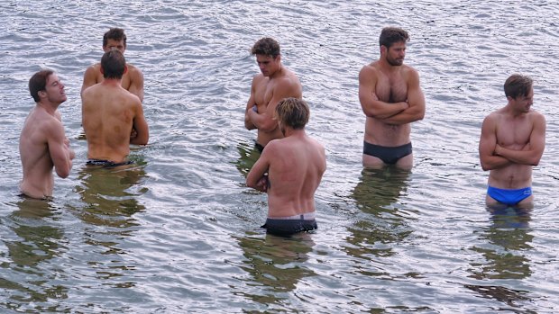 Carlton players take to Brighton Beach the day after their crushing loss to the Kangaroos.