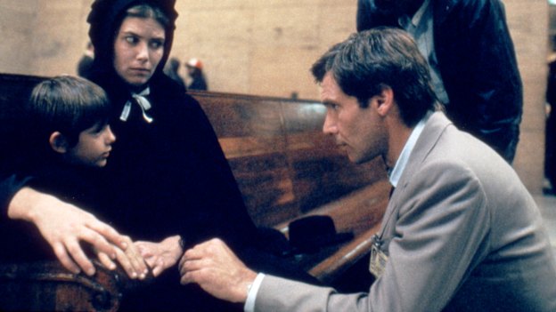 “Once you walk onto the set it’s the same anywhere”: Lukas Haas, Kelly McGillis and Harrison Ford in Witness.
