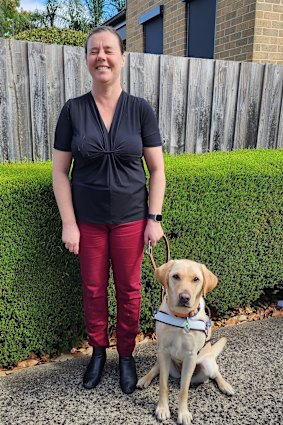 Paula Hobley with her guide dog, Vonda. Hobley, who is blind and routinely finds Uber drivers cancel trips when she is travelling with Vonda, is accusing Uber of breaching discrimination law. 