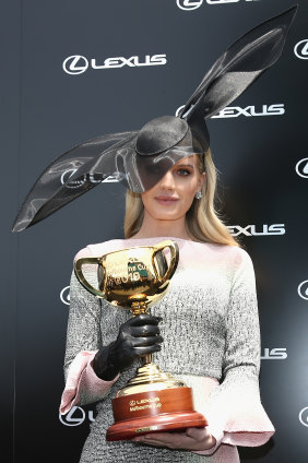 Lady Kitty Spencer at the 2019 Melbourne Cup, wearing a hat by Stephen jones and dress by Roland Mouret.