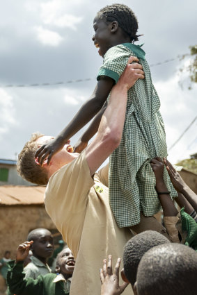 Sandy Hickson, co-founder of Nice Coffee Co, making friends at St John Community School in Kibera in October.