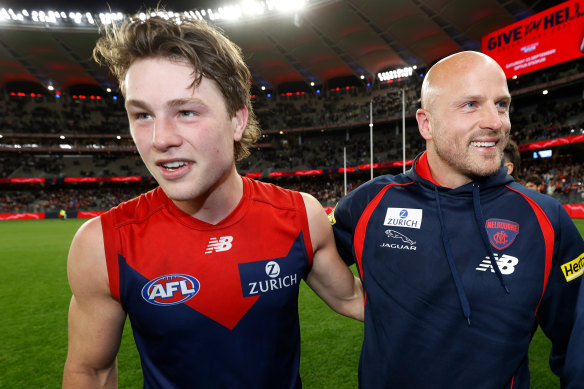 Nathan Jones (right) with Tom Sparrow after Friday night’s big win by the Demons to advance to the grand final.