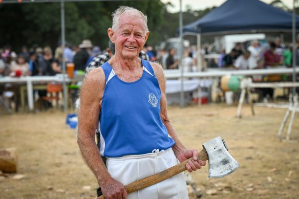 Don Hansford chipped away at the veterans’ wood-chopping contest.