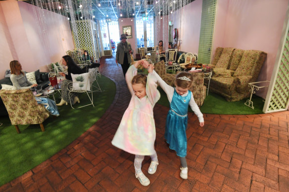 Harper and Scarlett, children of Madame Brussels customers, have a dance.