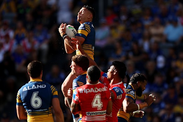Iongi leaps to take a high ball during the Eels’ win over the Dragons on Sunday.