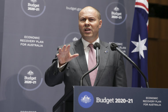 Treasurer Josh Frydenberg addresses the media at his budget press conference in Canberra.