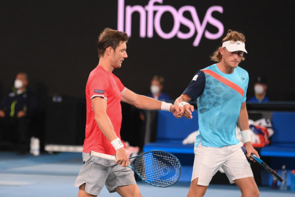 Matt Ebden and Max Purcell leave the court.