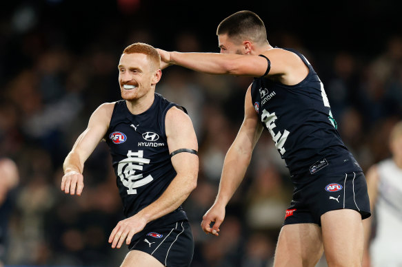 Matthew Cottrell, left, and Carlton teammate Nic Newman. 