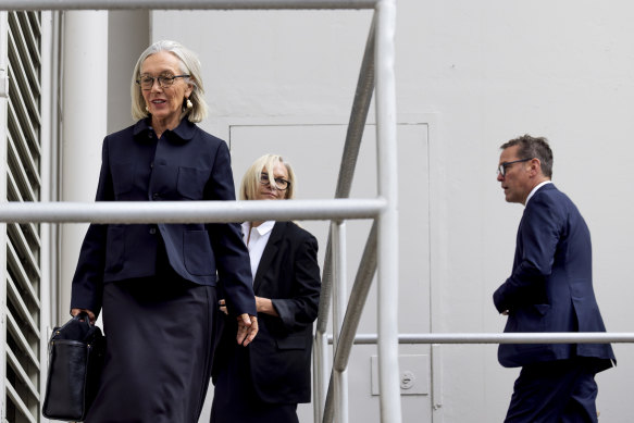 Prudence (left), Elisabeth and James Murdoch outside a Nevada court in September.
