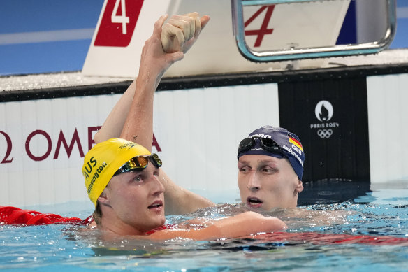 Winnington congratulates men’s 400m winner Lukas Maertens, of Germany.