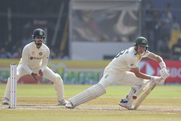 Australia’s Marnus Labuschagne plays a shot as India’s Shreyas Iyer watches during the third day of third Test between India and Australia in Indore on Friday.